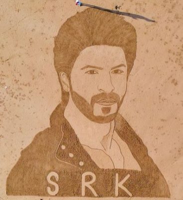 Shah Rukh Khan portrait by sand artist